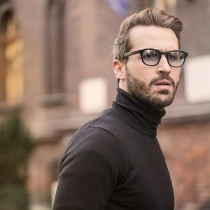 pexels-photo-874158-874158 A fashionable man with glasses and a beard captured outdoors in Budapest.
